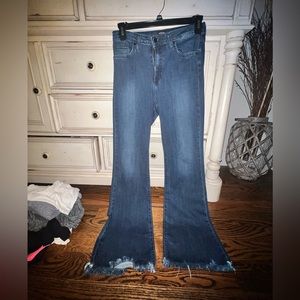 dark wash, distressed bottom boot leg / bell bottom jeans